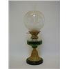 Image 1 : AN OIL LAMP, early 20th Century, part frosted globe shade, clear glass reservoir, brass trumpet b