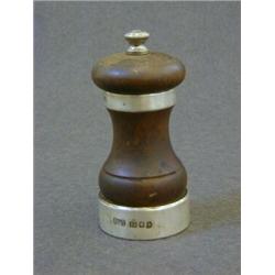 A TREEN PEPPER MILL, silver mounted, maker PG Co Ltd, London 1963  30-50