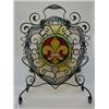 Image 1 : A HISTORICIST WROUGHT IRON FIRESCREEN, 19th Century, cartouche shape containing a stained glass p