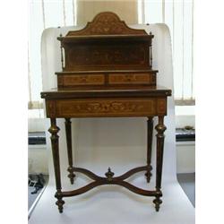A LADY'S ROSEWOOD WRITING TABLE, c.1890, raised stationery compartment, extensive marquetry and s