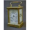 Image 1 : A BRASS CARRIAGE TIMEPIECE, enamel Roman dial with subsidiary seconds and calender dials, inset c