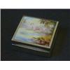 Image 1 : A SILVER TABLE CIGARETTE CASKET, maker S & M, Birmingham 1928, inset Royal Worcester plaque to co