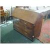 AN OAK BUREAU, c.1780, fall-front to an arrangement of pigeon holes and drawers, brass capped qua