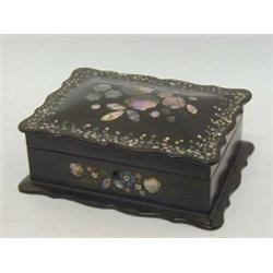 A PAPIER MACHE JEWELLERY CASKET, mid 19th Century, cartouche domed cover with mother of pearl inl