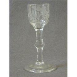 A WINE GLASS, c.1755, ogee bowl, wheel engraved Ho Ho bird and foliage, double baluster stem, cir