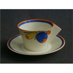 A CLARICE CLIFF BIZARRE CONICAL CUP AND SAUCER, 'Flora' pattern  80-100