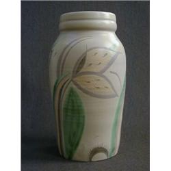 A SUSIE COOPER BALUSTER VASE, painted stylized tulips on a buff ground, signed 'Susie Cooper, 193