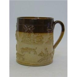 A STIFF & SONS SALT GLAZED STONEWARE MUG, 19th Century, sprigged hunging subjects, height 12cm  3