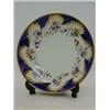 Image 1 : A BLOOR DERBY SAUCER DISH, c.1830, blue reserve, gilt border, polychrome floral swags, printed fa