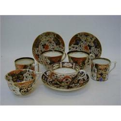 A PAIR OF DERBY DUESBURY PERIOD TEA CUPS/SAUCERS, two coffee cans, a tea cup and another tea cup