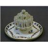 Image 1 : A DRESDEN TABLE CIGARETTE DISPENSER, early 20th Century, polychrome floral sprays, gilt swags and