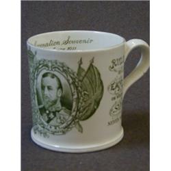 A HARRODS ROYAL COMMEMORATIVE MUG, 1911, green transfers, an Empire Porcelain Co. example and a 1
