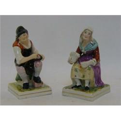 A PAIR OF SEMI-PORCELAIN FIGURES, late 19th Century, Cobbler and Cobbler's Wife, (after the Staff