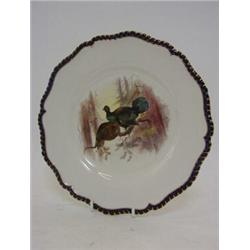 A ROYAL WORCESTER VITREOUS CABINET PLATE, 1898, painted two game birds in woodland setting (unsig