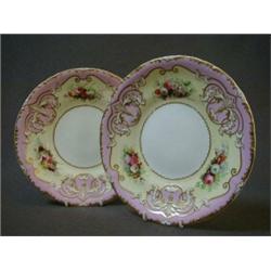 A PAIR OF COPELAND AND GARRETT CABINET PLATES, c.1840, floral arrangements on a pastel yellow gro