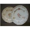 Image 1 : A PAIR OF COALPORT CABINET PLATES, 19th Century, transferred and over-painted flower sprays on a