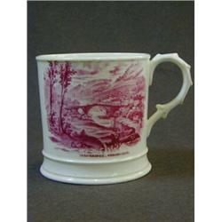 A COALPORT MUG, mid 19th Century, puce transfer prints 'Ironbridge' and 'Buildwas Abbey', height
