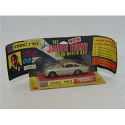 A BOXED CORGI TOYS JAMES BOND ASTON MARTIN DB5, No.270, silver livery, pictoral wing flap box  10