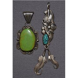 TWO NAVAJO SILVER PENDANTS