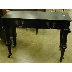 French writing table with some internal fitments, ebonised with gilt metal faun handles. £150-200