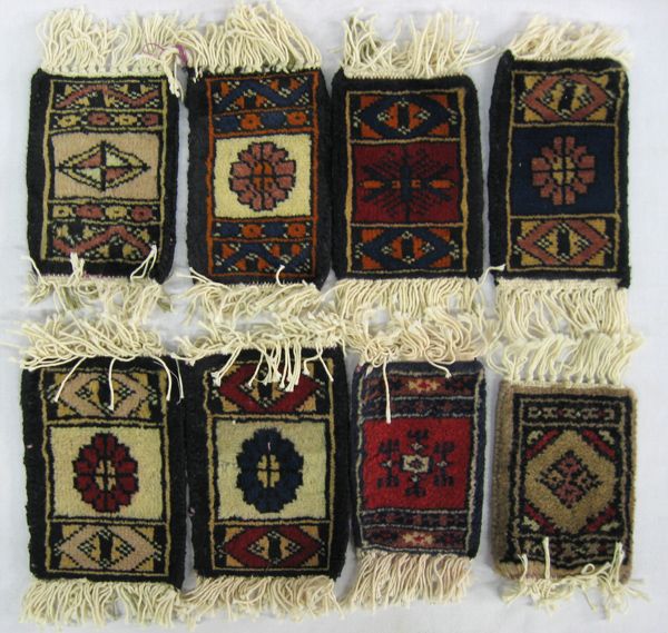 Collection of 8 Miniature Persian Rugs