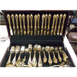 Sixteen Piece Set Gold Silverware in Box