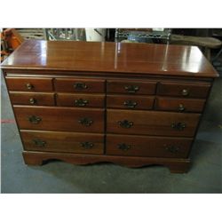 Six drawer dresser with mirror, dark brown.