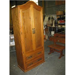 Solid oak armoire, eight drawers with shelving.