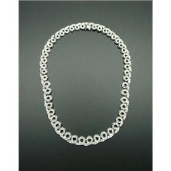 An 18 kt. white gold and diamond necklace. Un...