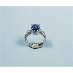 An elegant platinum and diamond ring set with...