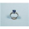 Image 1 : An elegant platinum and diamond ring set with...