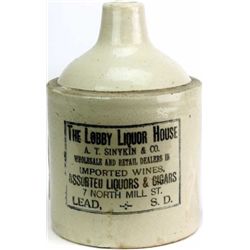 Antique stoneware advertising whiskey jug