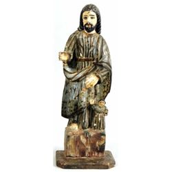 Polychromed hand carved Santos with child