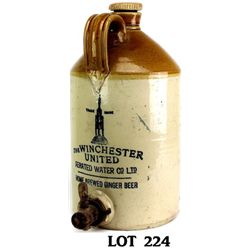 Antique stoneware dispenser marked Winchester