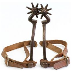 Early pair iron spurs bottle opener style shanks,