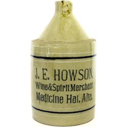 Scarce antique stoneware advertising whiskey jug