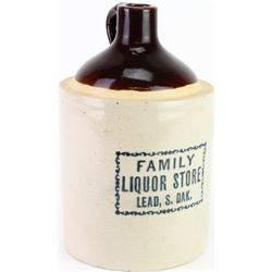 Antique stoneware advertising jug marked