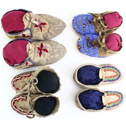 Collection of 4 pair childs moccasins.