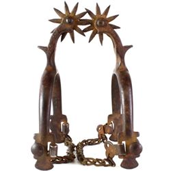 Buermann iron spurs with original heel chains.