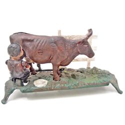 VINTAGE FARMER MILKING COW MECHANICAL COIN BANK