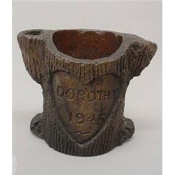 THREE PIECES OF SEWER TILE. Two are tree trunk shaped desk sets with three trunks each. The large…