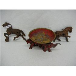 2 Cast Iron Horses, 1 Broken Leg on both, and Red Cast Iron Elephant Bowl, broken trunk