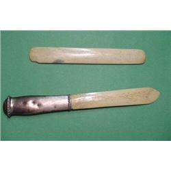 TWO WHALE BONE ITEMS. Busk (small flake), 7 l. and a letter opener with a silver handle marked  8…