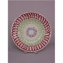STICK SPATTER PLATE. Red, green, dark purple looping patterns. Impressed "Cotton & Barlow". 8 3/4…