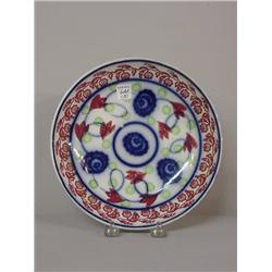 THREE PLATES. Two are stick spatter with differing floral designs in red, green, and flow blue (o…