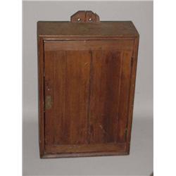 COUNTRY HANGING CUPBOARD. Pine with areas of the original red wash. Square cut nails. One raised …