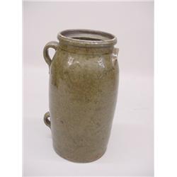 TWO PIECES OF SOUTHERN POTTERY. Redware with green ash glaze. Jug with incised lines around the s…