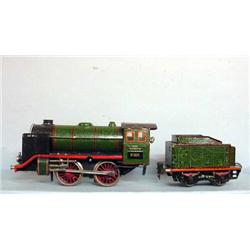 "MARKLIN" WINDUP TRAIN. Engine and tender have matching alligatored green paint with red and blac…