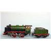 Image 1 : "MARKLIN" WINDUP TRAIN. Engine and tender have matching alligatored green paint with red and blac…