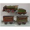 Image 3 : "MARKLIN" WINDUP TRAIN. Engine and tender have matching alligatored green paint with red and blac…